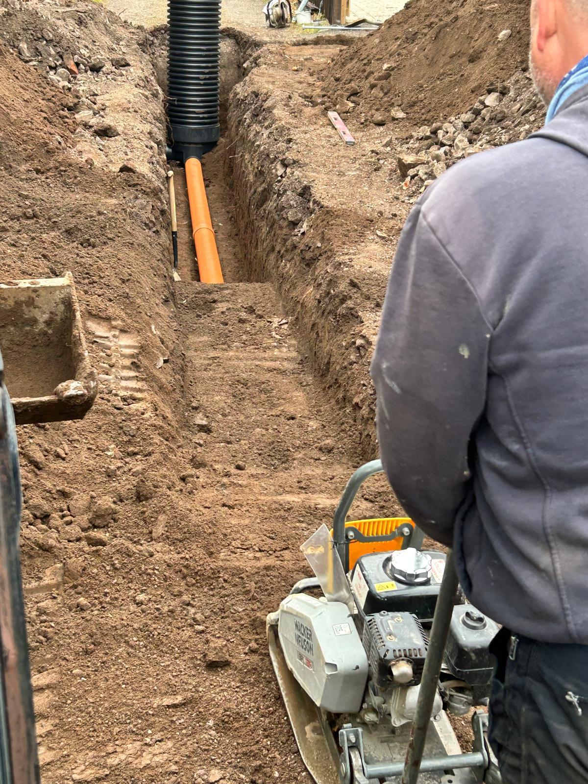 Completed drainage scheme with inspection chambers and rodding points