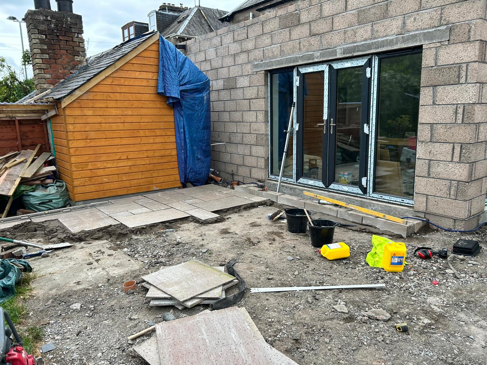Rear extension with timber cladding and glazing during construction