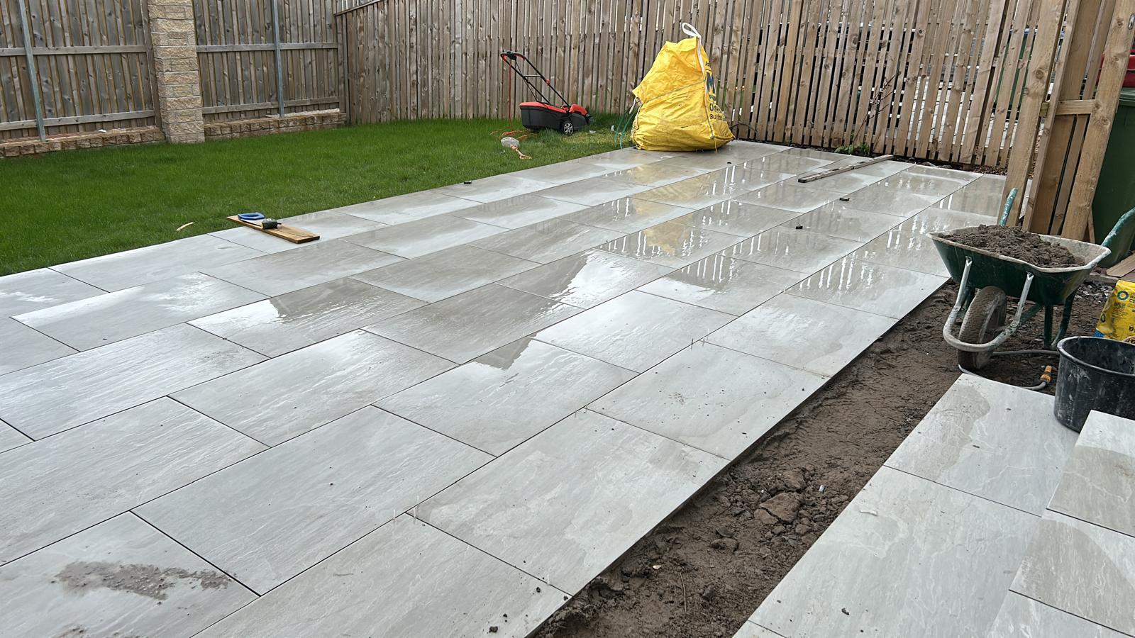 Large format porcelain patio laid in running bond pattern