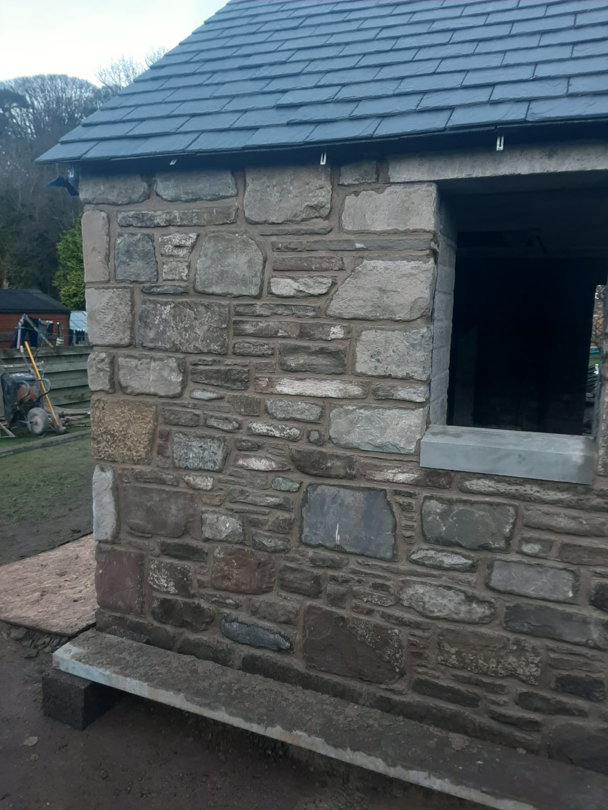 Stone-built outbuilding with hand-laid natural stone walling