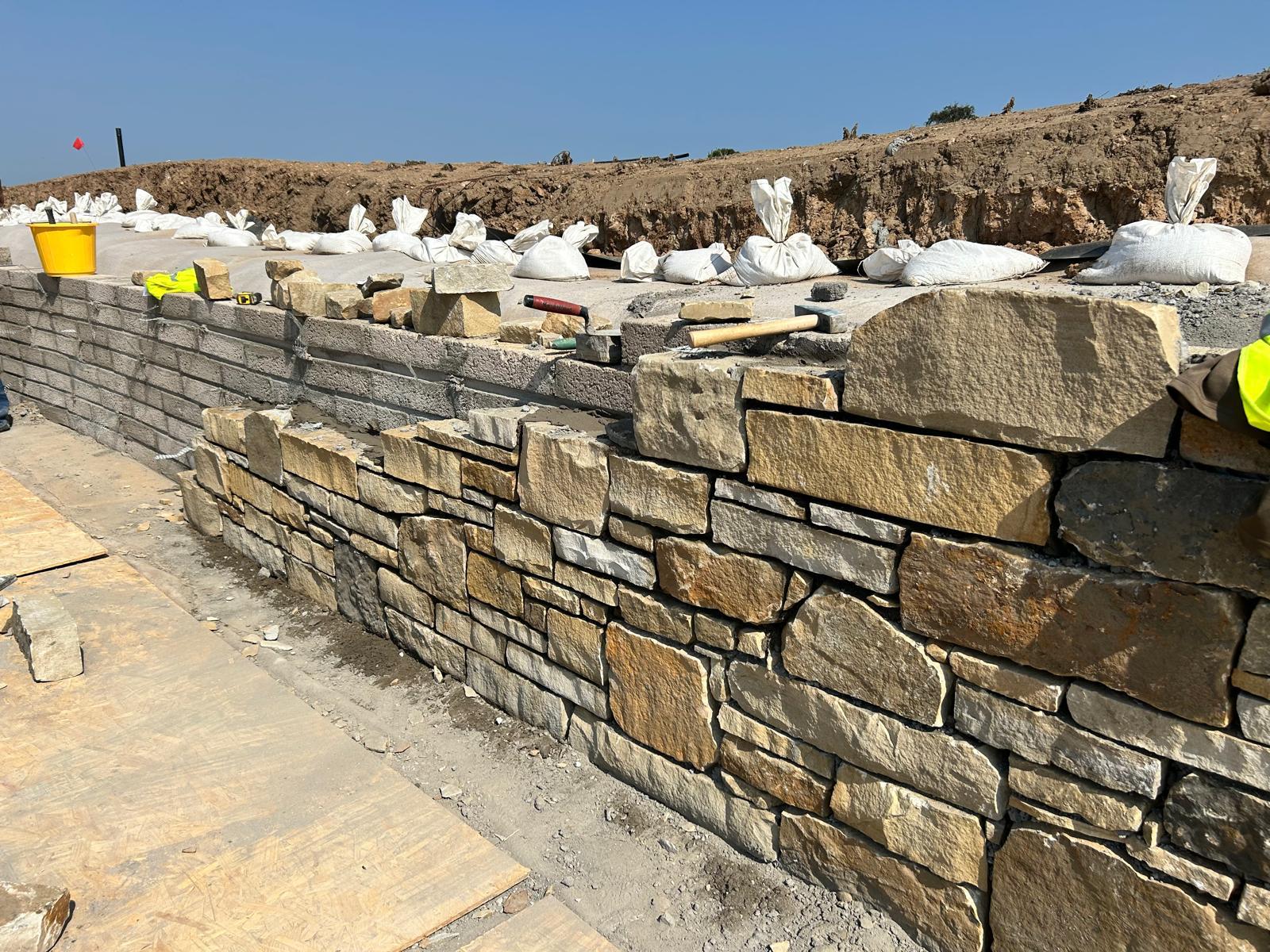 Dry stone and mortared boundary wall construction, Perthshire